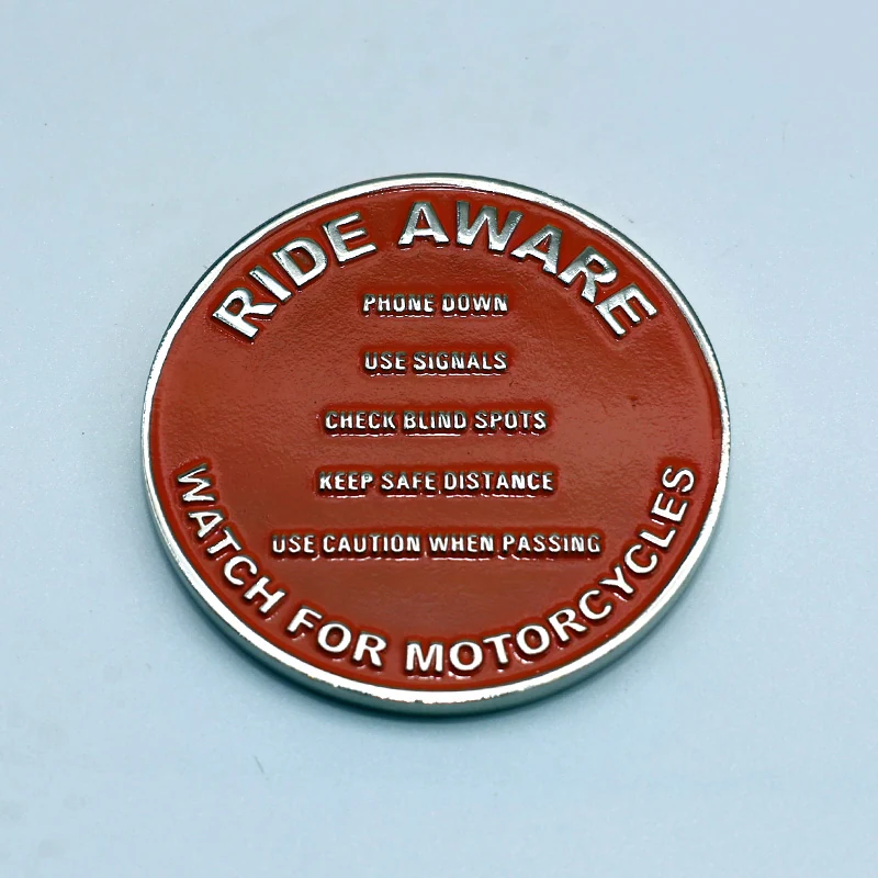 Reverse side detail of a custom American eagle challenge coin with unit name and emblem