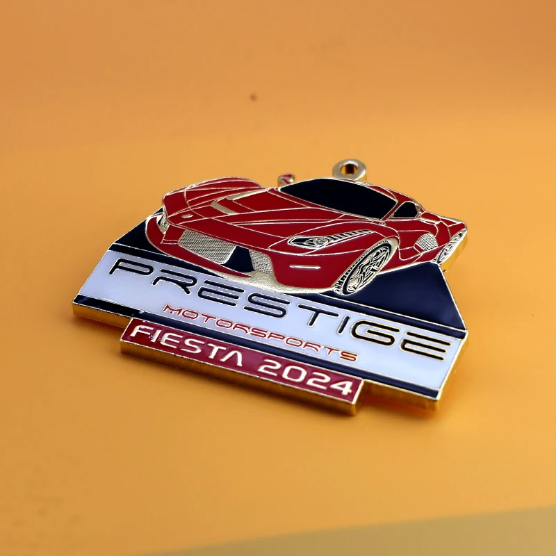 Medal with jump ring attachment and clear epoxy dome under daylight