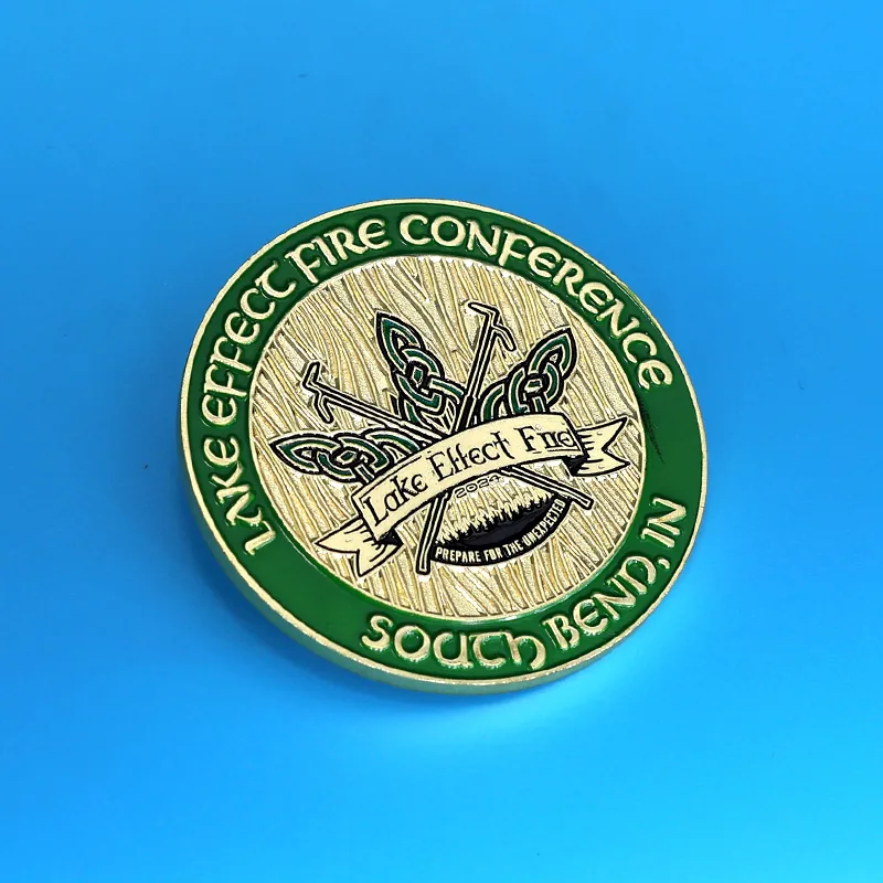 Close-up of the fire fighting flame detail on a custom challenge coin with soft enamel fill