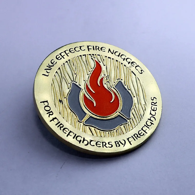 Custom fire fighting flame challenge coin with red and yellow enamel on a polished gold finish