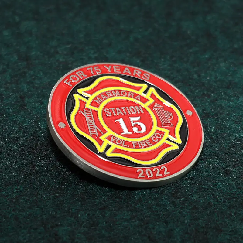 Set of three custom challenge coins in gold silver and bronze with matching enamel fills
