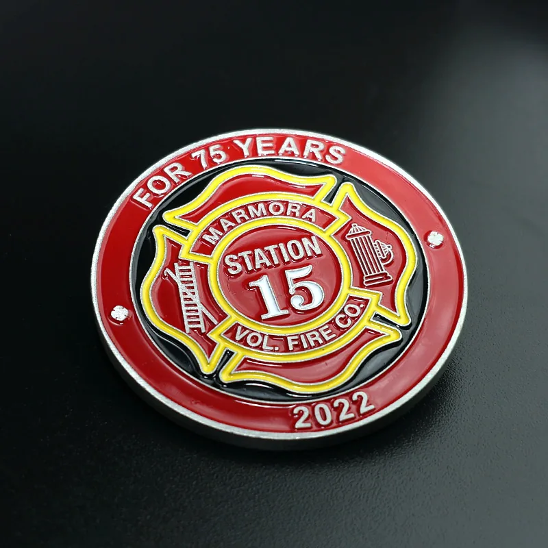 Custom fire department challenge coin with red white and blue enamel on a polished gold finish