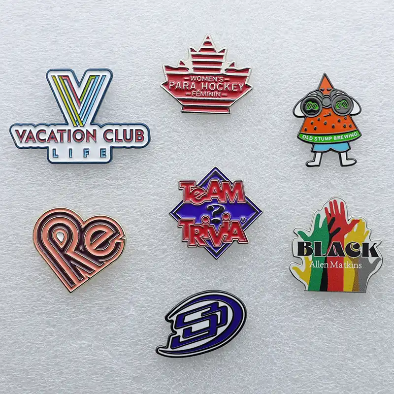 Close-up of hand-shaped heart pin showing soft enamel detail and pin back