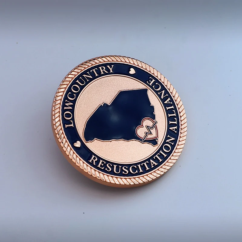 Reverse side and pin back detail of a custom peace and love commemorative coin
