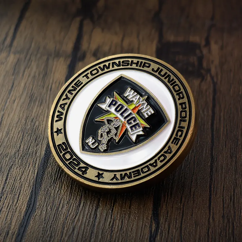 Side view of a custom challenge coin showing the thickness and pin back attachment