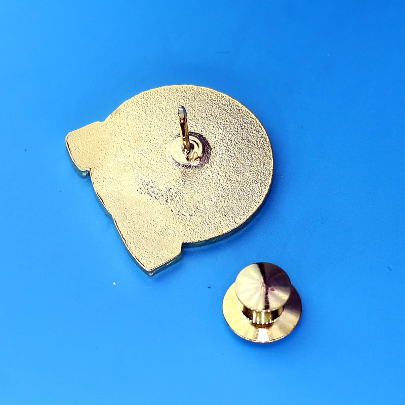 Reverse side of a custom clover lapel pin with a blank surface