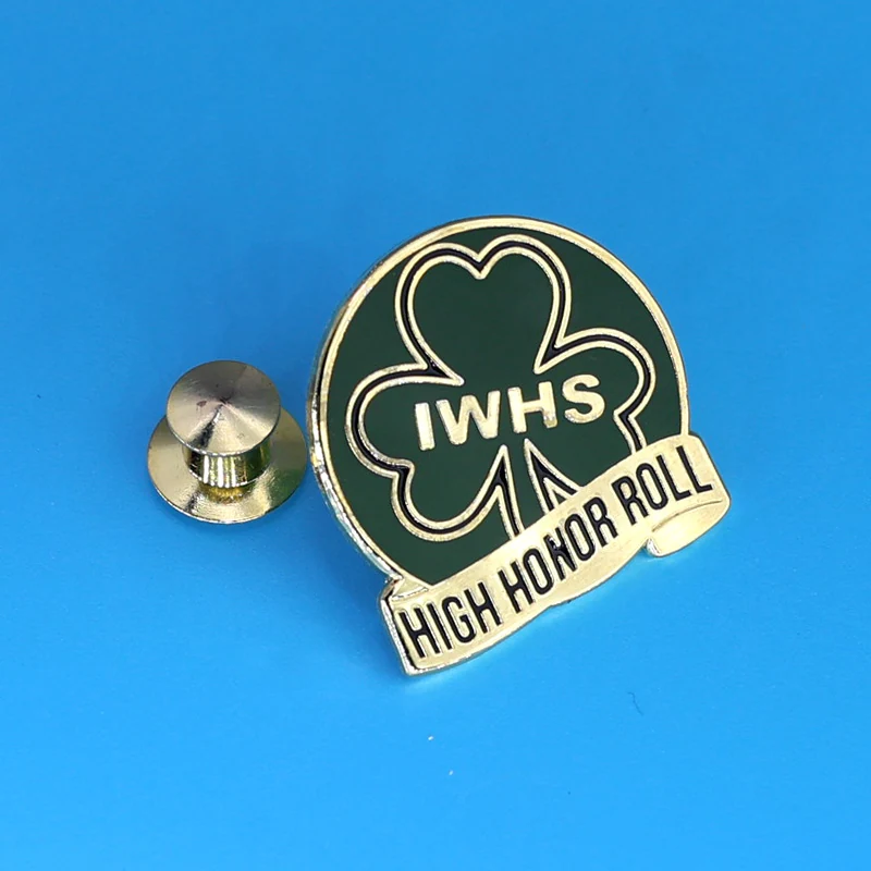 Multiple custom clover lapel pins in green white and gold variants