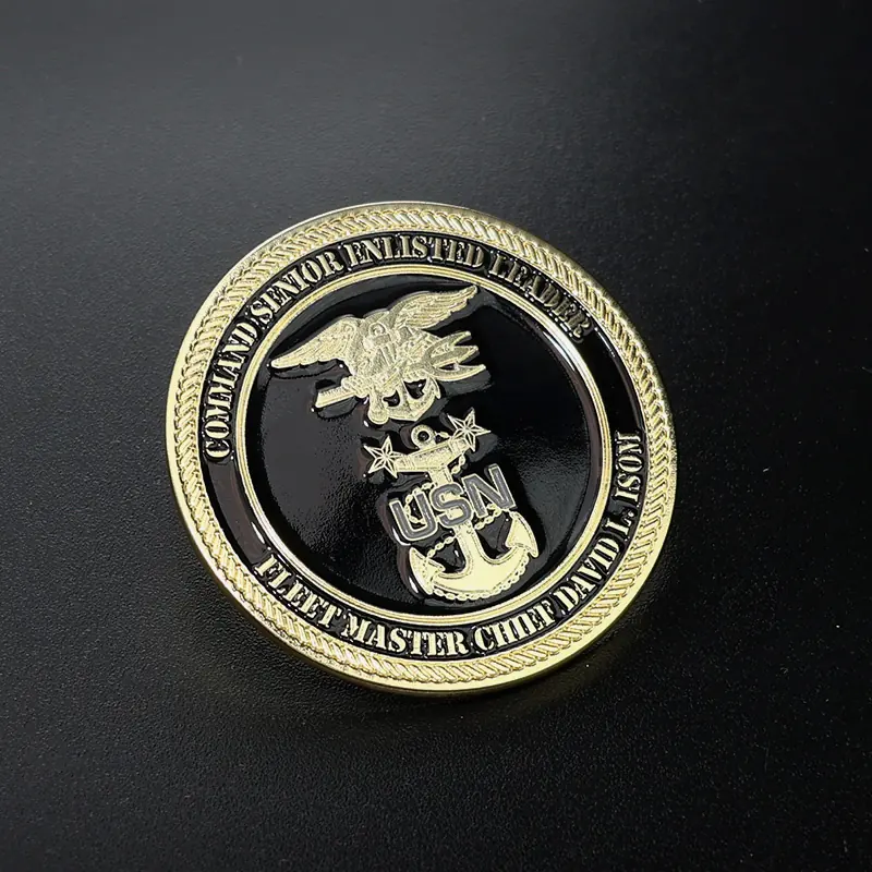 Reverse side of a custom Earth challenge coin with a globe outline and engraved details