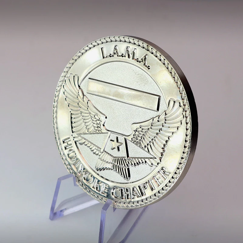 Multiple challenge coins in a set with different finishes from one die