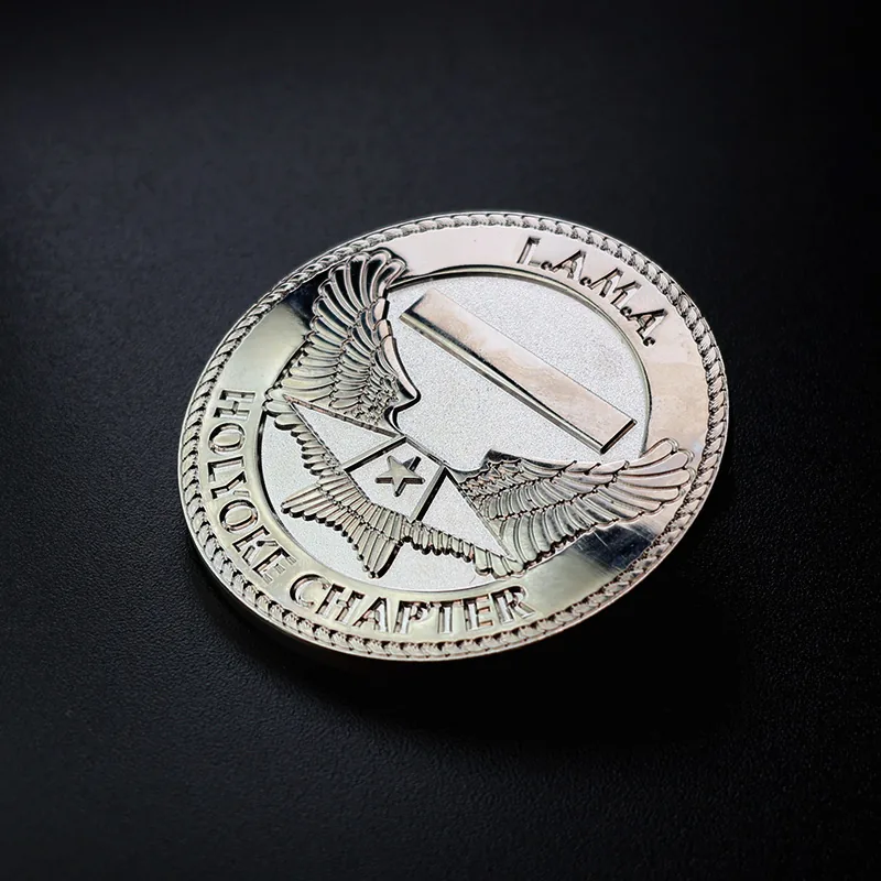 Reverse side and pin attachment detail of a custom die struck challenge coin
