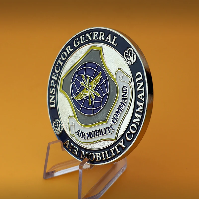 Close-up of the hand-filled soft enamel and raised die struck detail on a Navy coin