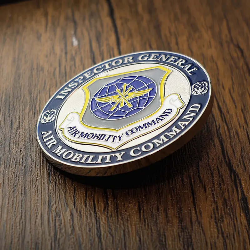 Custom United States Navy challenge coin with navy blue and gold enamel on a polished gold finish
