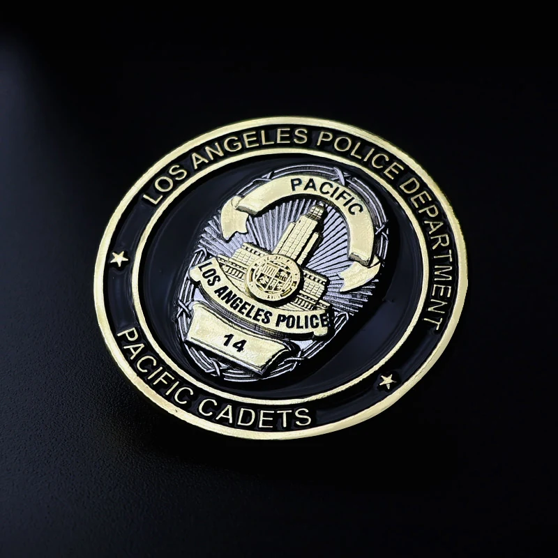 Set of custom 3D challenge coins with gold plating, each with unique design and enamel detail