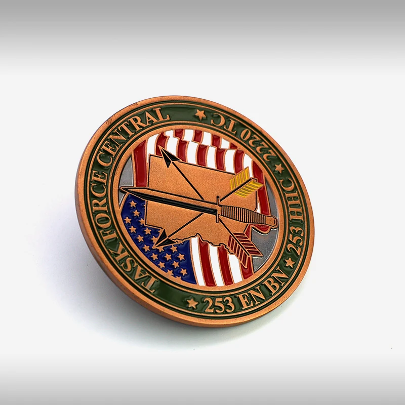 Reverse side and pin back detail of a custom copper enamel challenge coin