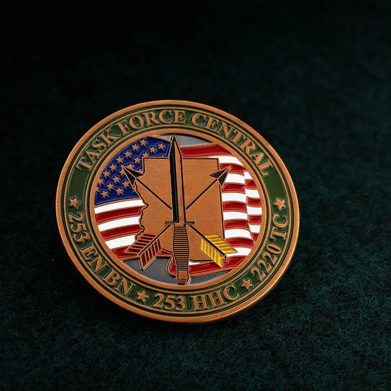 Close-up of hand-filled soft enamel on a copper challenge coin