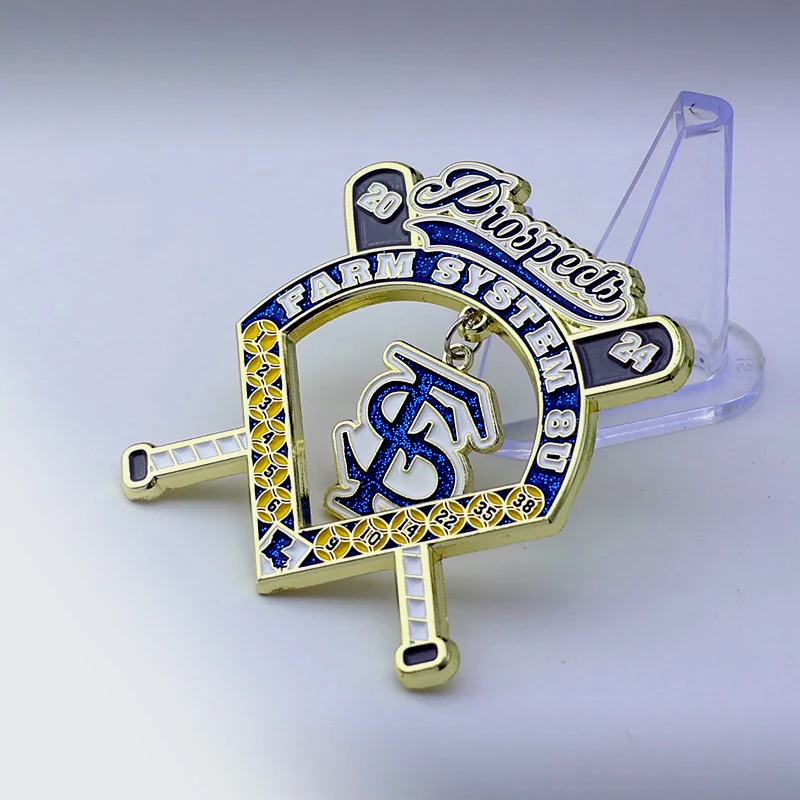 Custom gold baseball lapel pin with red white and blue enamel on a metal pin back with loop