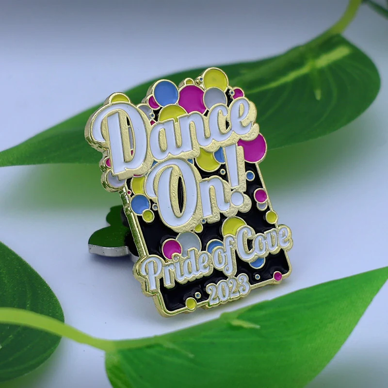 Set of three custom word lapel pins with different words in gold enamel