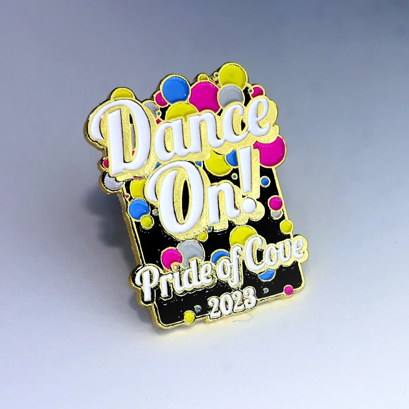 Custom gold enamel lapel pin with the word 'Family' in raised lettering on a polished gold finish