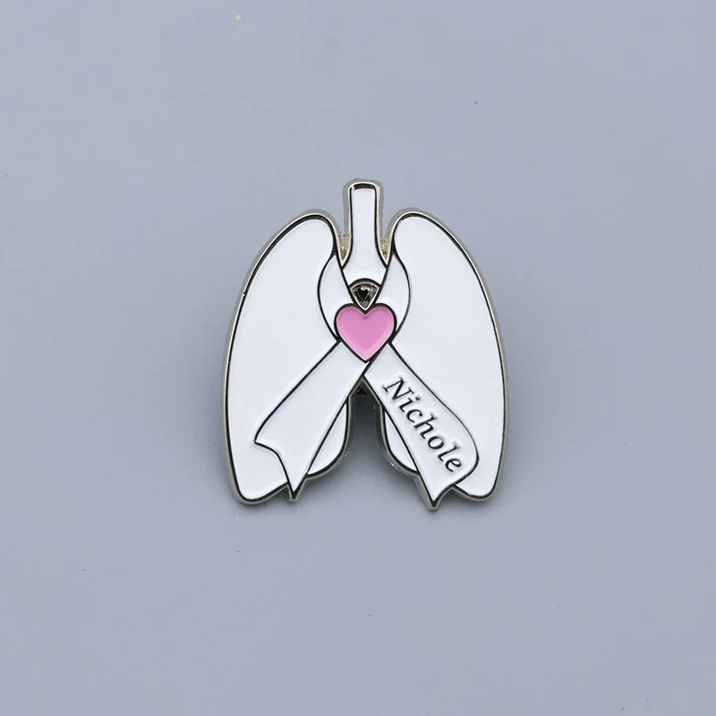 Custom silver-plated lapel pin with white lung organ, white ribbon, pink heart, and engraved name