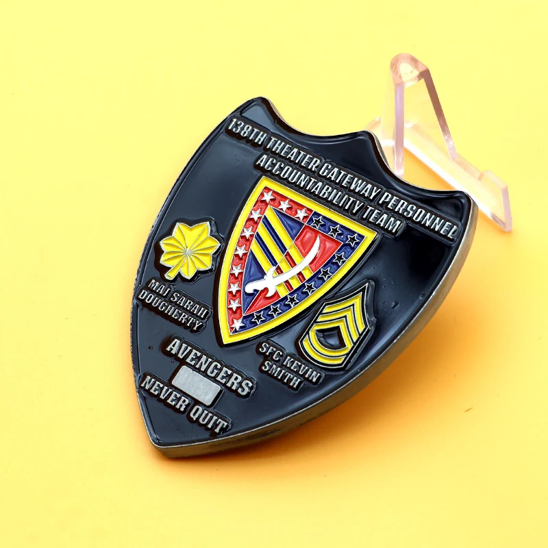 Side view of a custom naval shield badge showing the soft enamel fill and pin back attachment