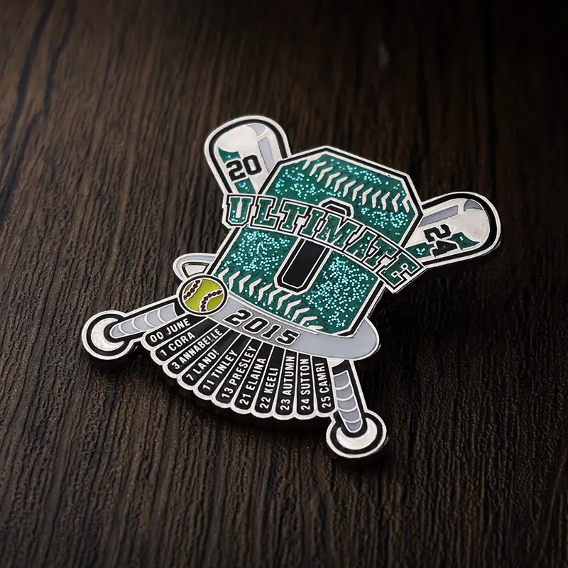 Reverse side of a custom silver baseball pin with a pin back and engraved team logo
