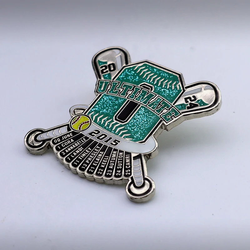 Custom silver baseball trading pin with glittered stitching and raised outline on a dark background