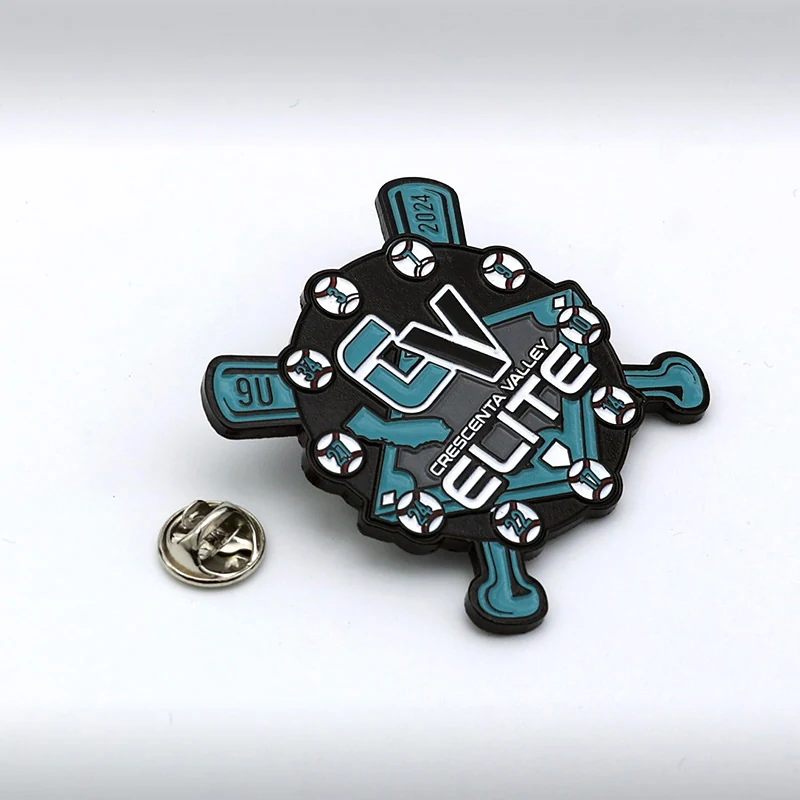 Group of black metal baseball trading pins with different team logos and plating finishes