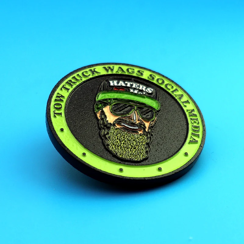 Side view of a custom challenge coin showing the thickness and pin back attachment