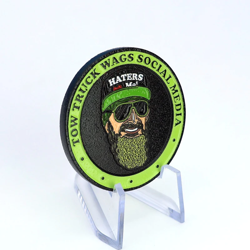 Group of custom challenge coins with different individual head portraits and finishes