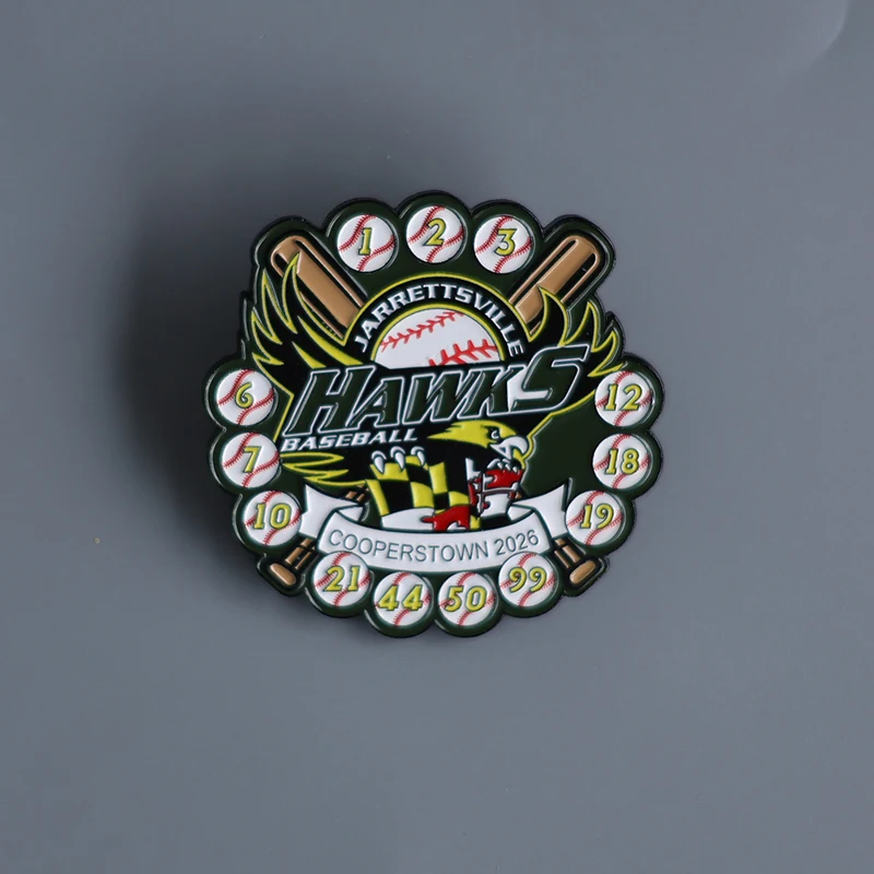Reverse side detail of a custom youth baseball trading pin with team logo and pin back attachment