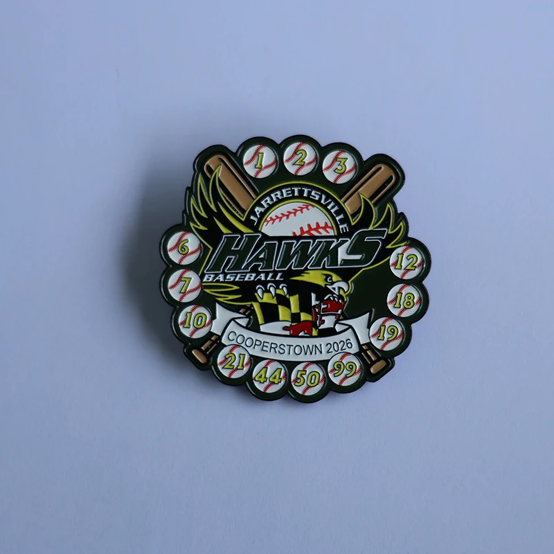 Custom gold Jarrettsville Hawks baseball pin with red white and blue enamel, featuring the Hawks mascot and 'Cooperstown 2026' text