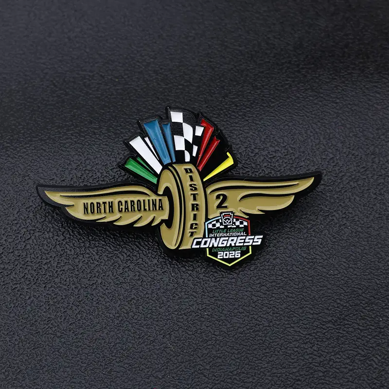 Reverse side and pin back detail of a custom die struck enamel lapel pin with district logo and event year