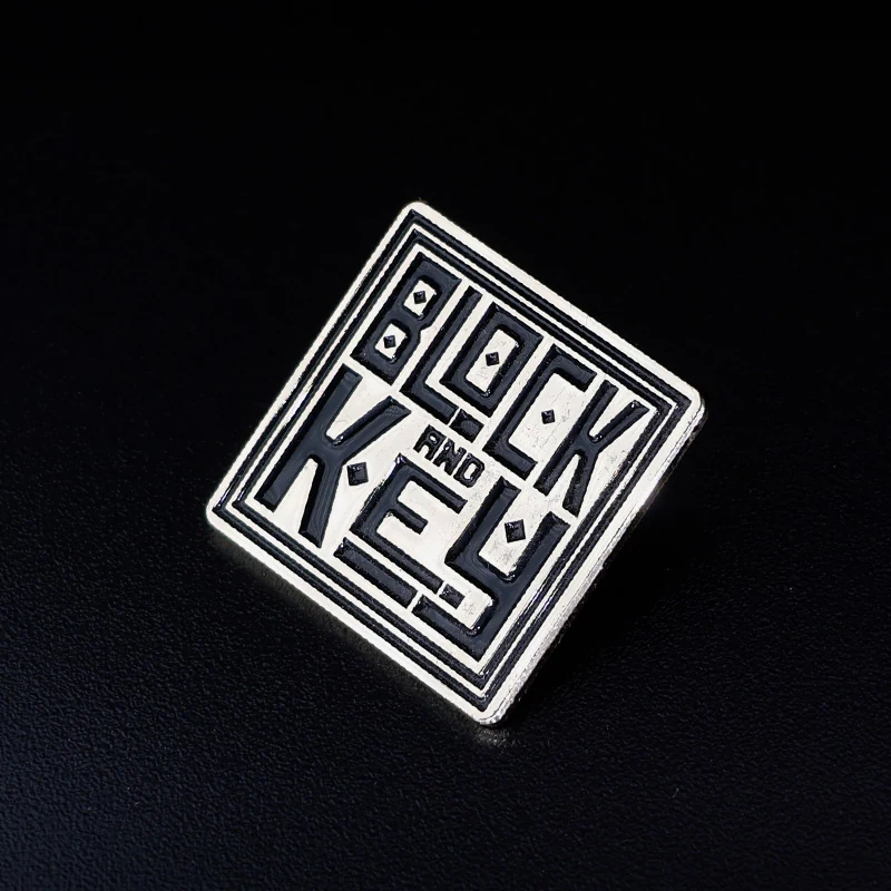 Back view of a custom enamel lapel pin with engraved reverse side