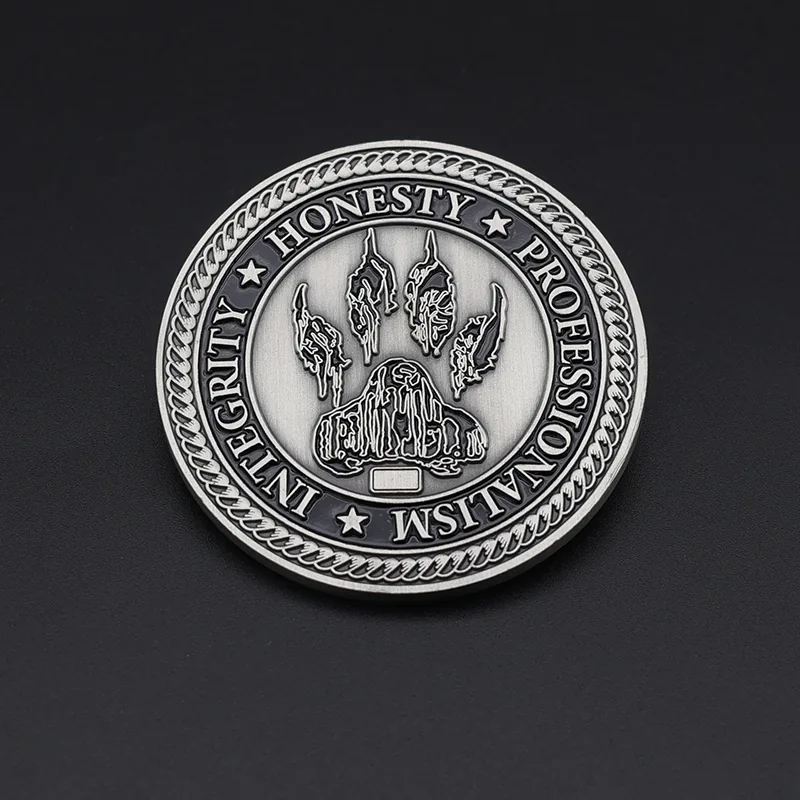 Close-up of a custom challenge coin with soft enamel fill and raised metal edges