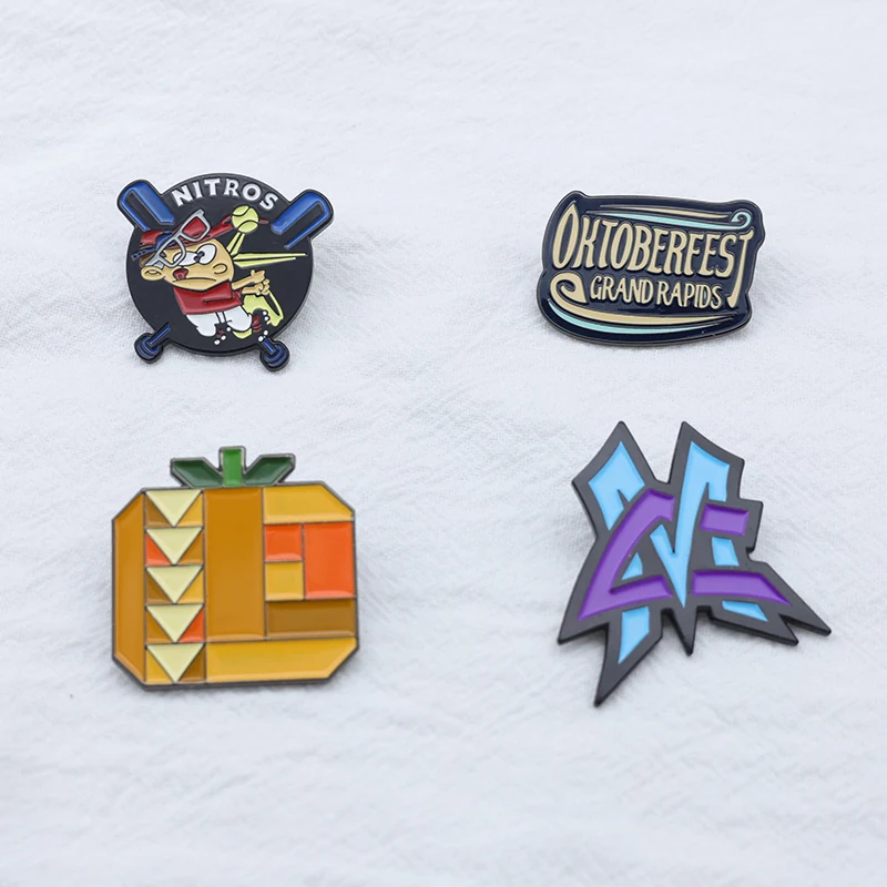 Multiple baseball lapel pins laid out with different colour variants and team names