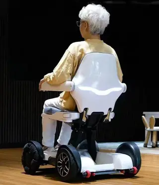 Electric wheelchair high back curved seat and armrests