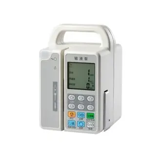 Infusion pump door opened to show the tubing channel