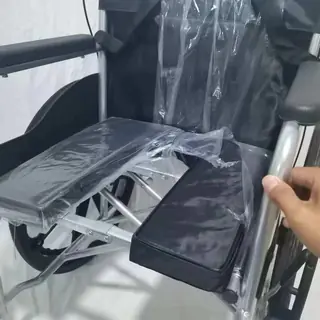 Manual wheelchair footrest and front castor detail