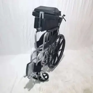 Manual wheelchair folded for transport and storage