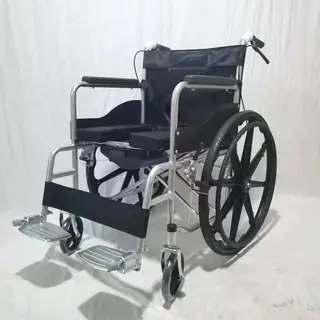 Manual wheelchair side view showing seat and rear wheel