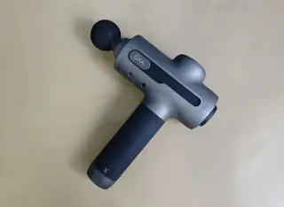 Fascia gun handle with speed control display