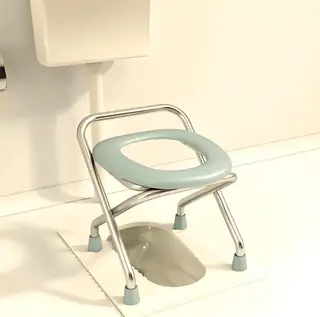 Anti-slip rubber foot pads on the commode chair frame