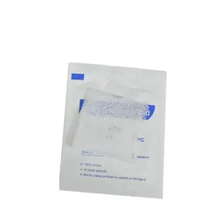 Medical gauze tape applied in a cross seal on a cotton pack