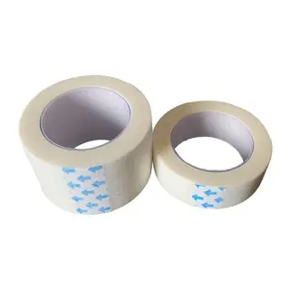 Medical tape roll showing the wood pulp backing