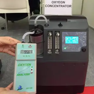 Portable oxygen concentrator body and carry handle