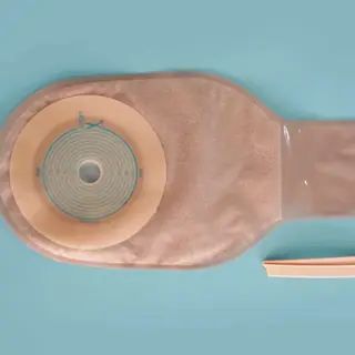 Ostomy bag outlet and closure detail