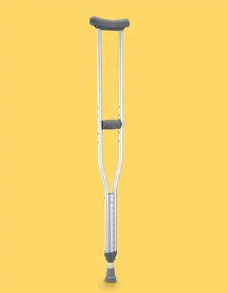 Crutch height adjustment button and hole positions