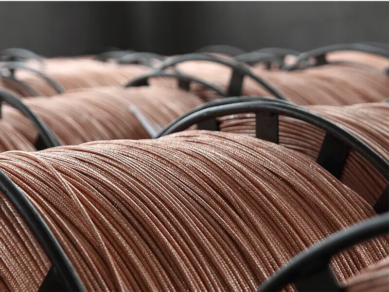 Semi-finished RG6 coaxial cable cores wound on reels ready for jacketing