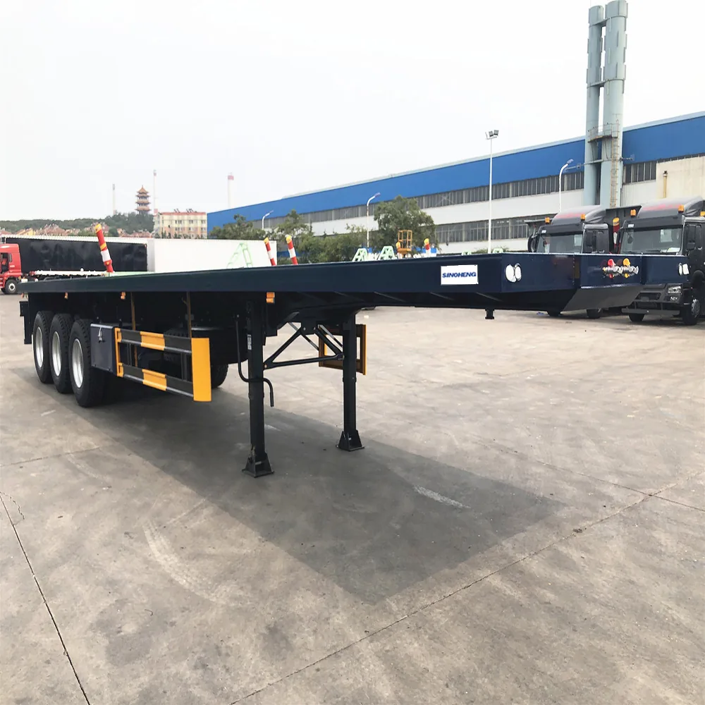 SINOHENG platform semi-trailer with hydraulic self loading tipping deck view 2