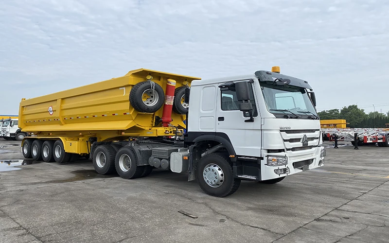 SINOHENG rear dump semi-trailer coupled to a Sinotruk HOWO prime mover view 3